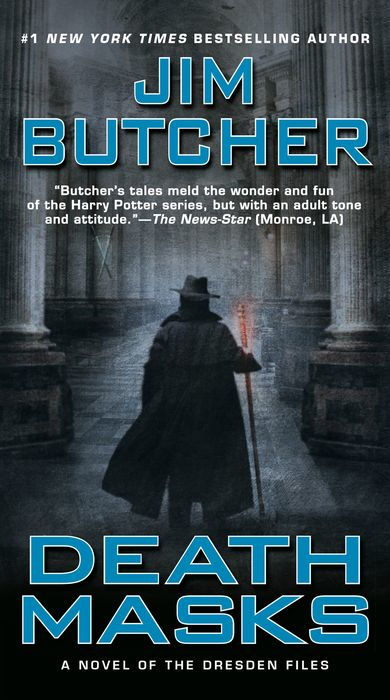 Book cover of 'Death Masks' by Jim Butcher featuring a silhouette in a grand hall.