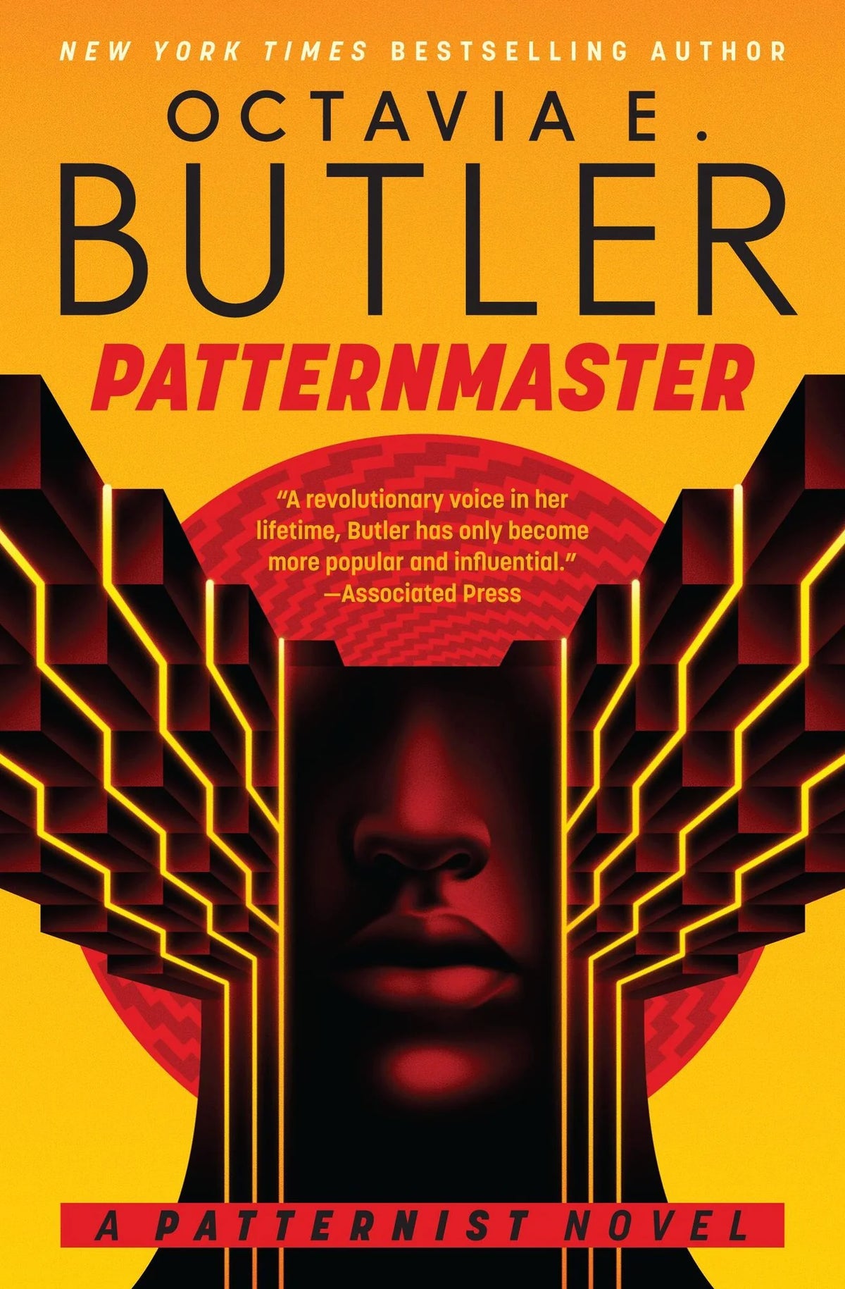 Book cover of 'Patternmaster' by Octavia E. Butler with a stylized face and geometric design on a yellow background.