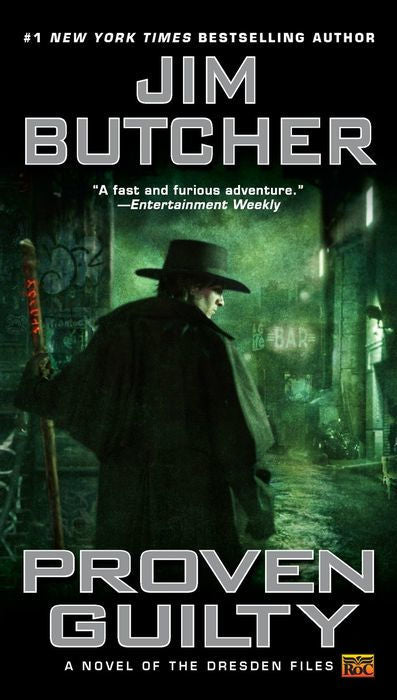 Book cover of 'Proven Guilty' by Jim Butcher featuring a character in a dark alleyway.